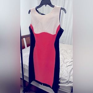 Color block dress • Blocks of solid color that creates a slim contrast • Sheath